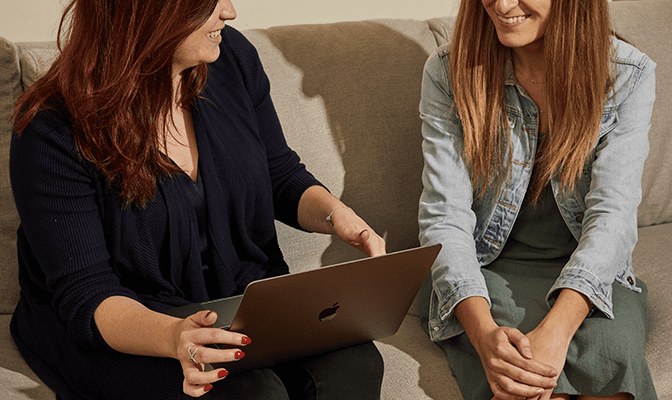 image of two women talking