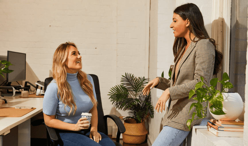 Two women discuss goal setting