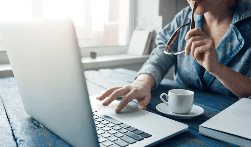 This is an image of a person sitting at a computer.
