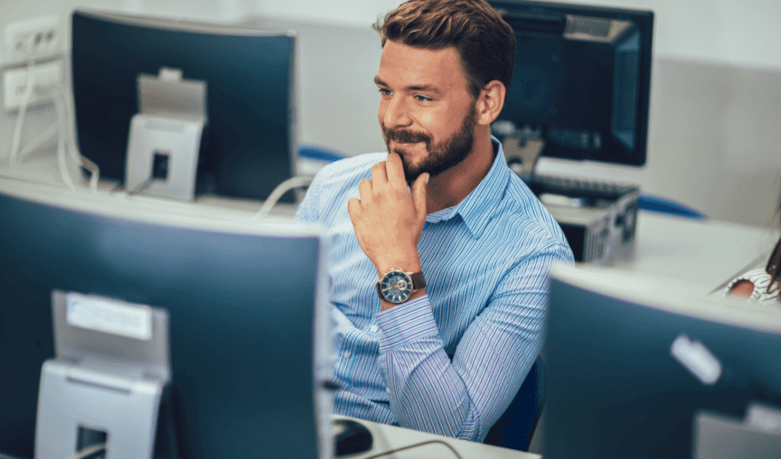 Man working at his computer in the office.